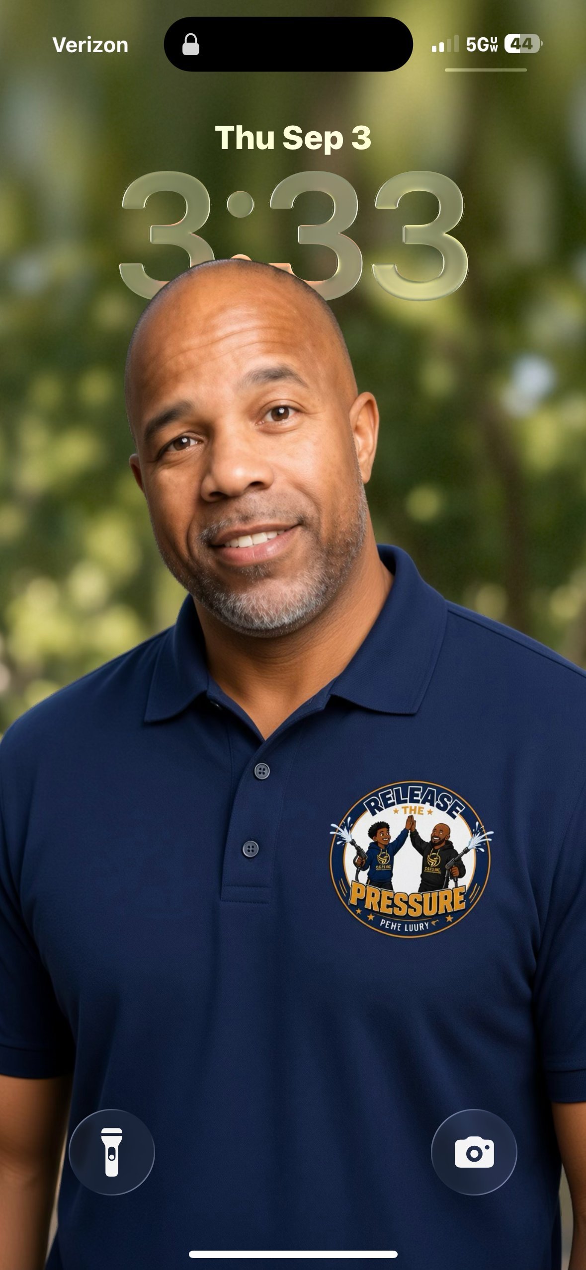 Corey Baker, founder of Release the Pressure, in the navy Release the Pressure branded polo shirt